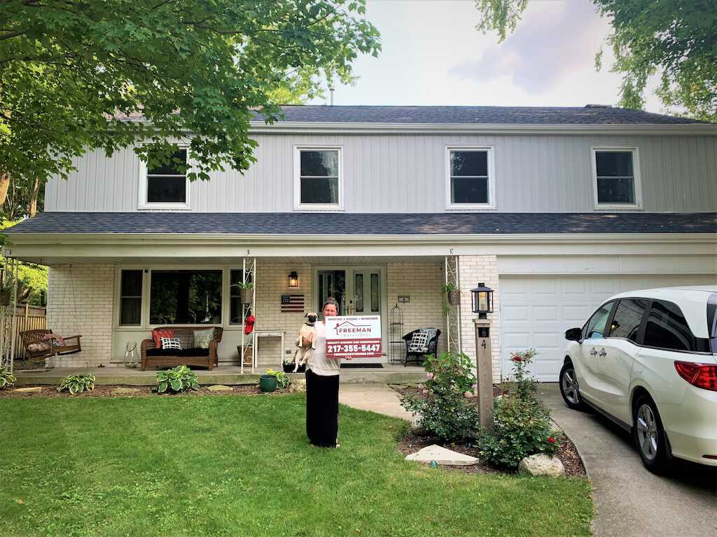 Storm damaged roof repair in Champaign, IL