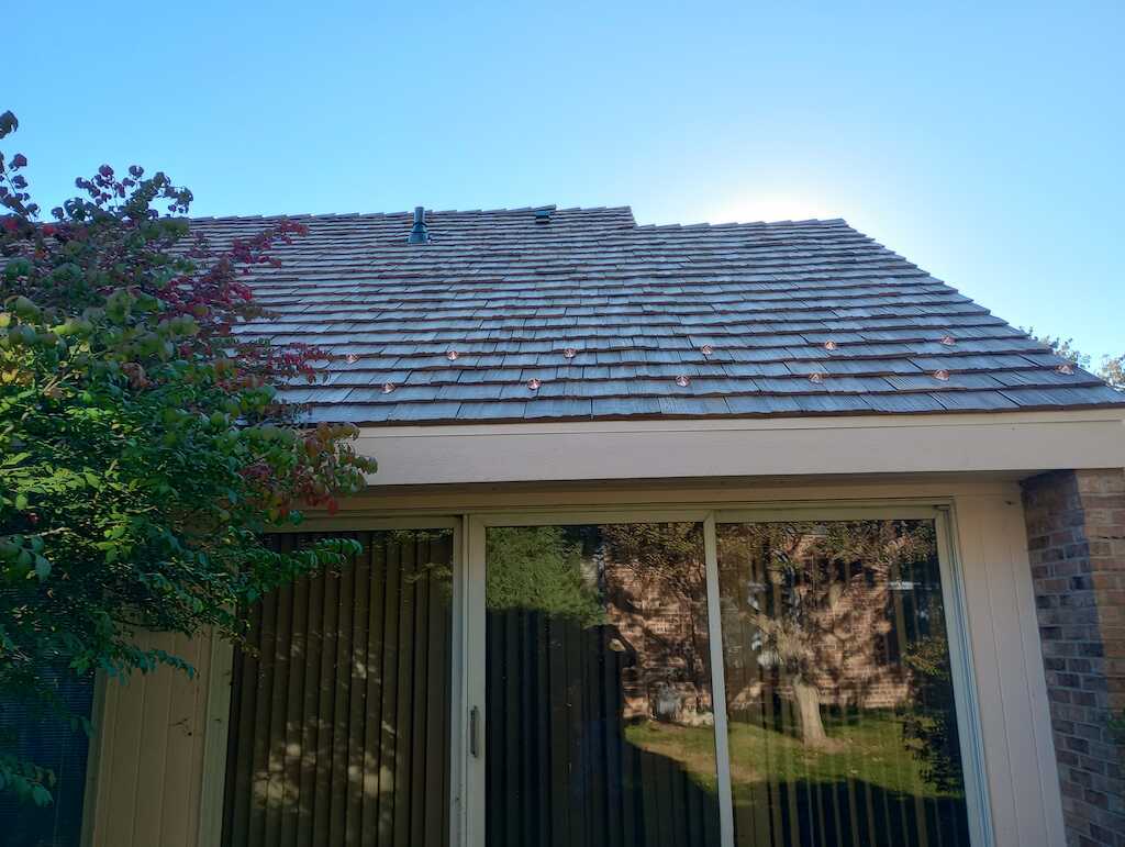 Hail Storm Damaged Roof repair in Champaign, IL