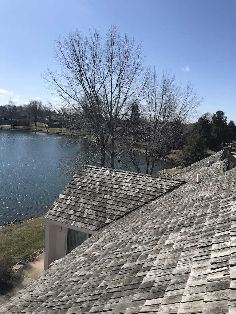 Hail Storm Damaged Roof repair in Champaign, IL