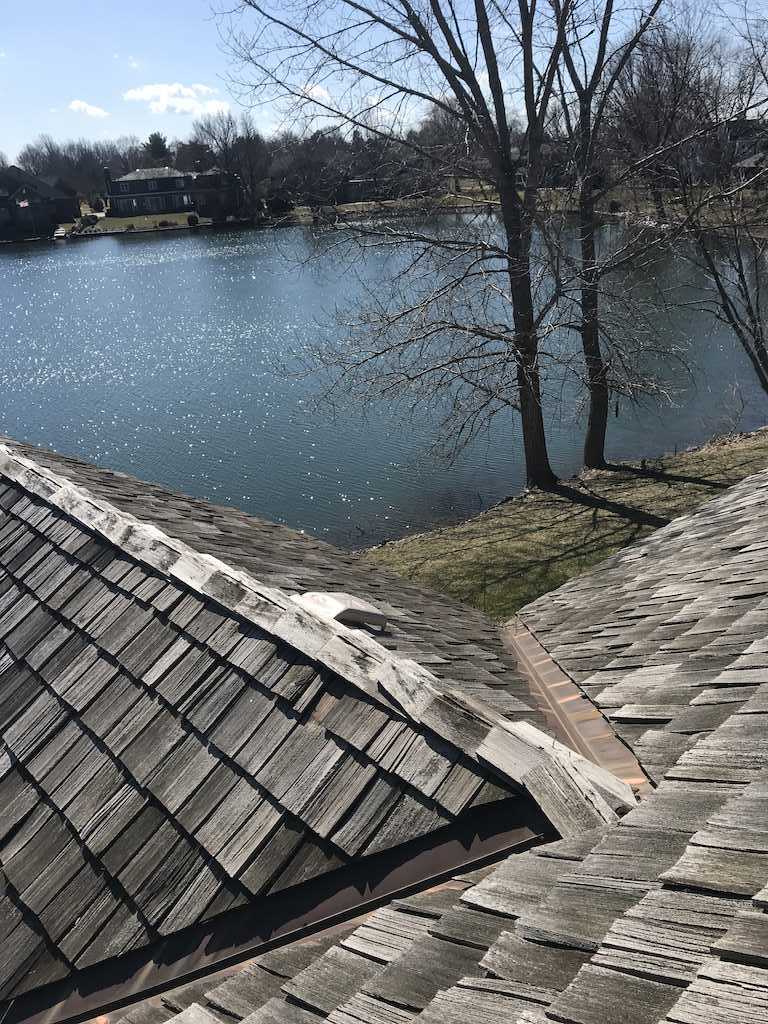 Hail Storm Damaged Roof repair in Champaign, IL