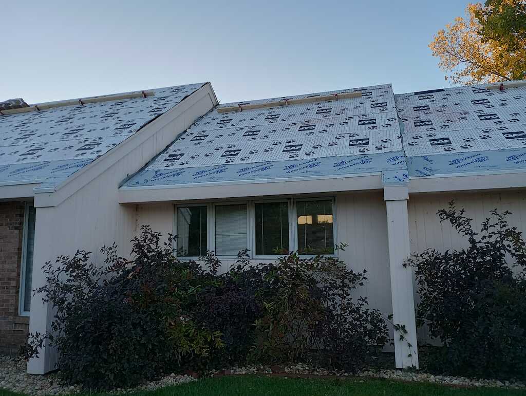 Hail Storm Damaged Roof repair in Champaign, IL