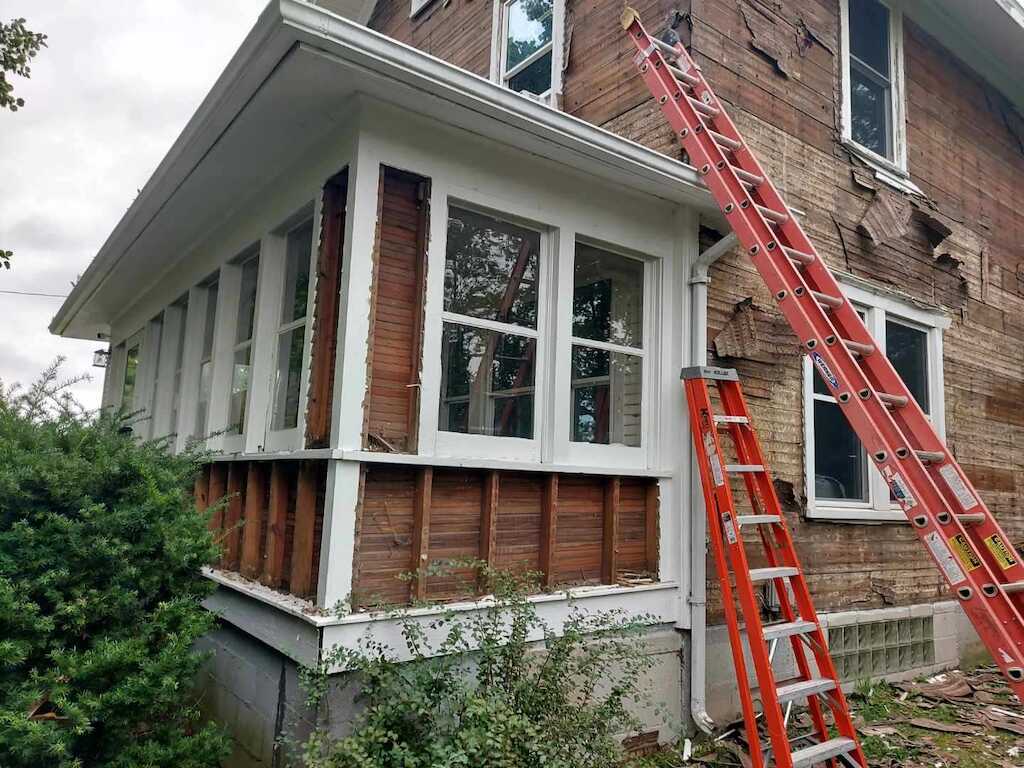 storm damaged siding repair in tuscola il during