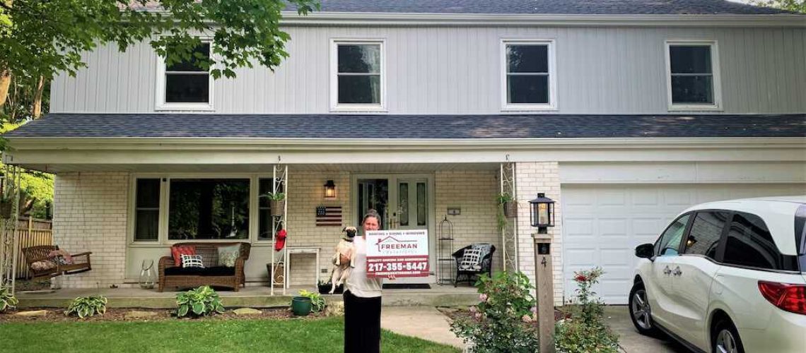 Storm damaged roof repair in Champaign, IL
